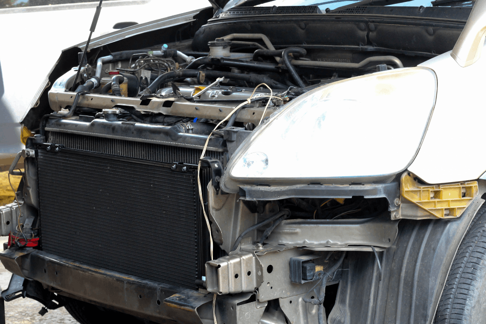 Cooling system service, auto repair in Summerville, SC at SBS Automotive Maintenance and Repair. Image of a vehicle with the front bumper removed during professional radiator and cooling system repair.